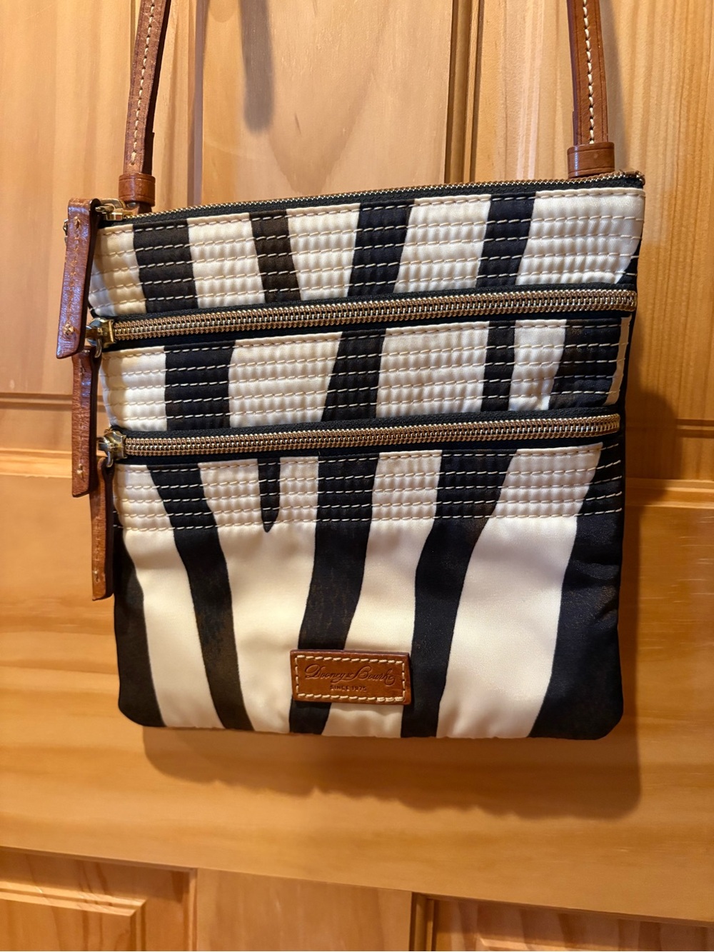 Dooney & Bourke Zebra Print Triple Zip Crossbody Bag